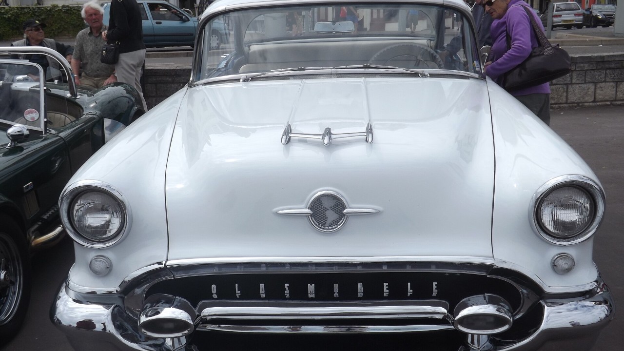 A 1955 Oldsmobile Super 88 Holiday Sedan