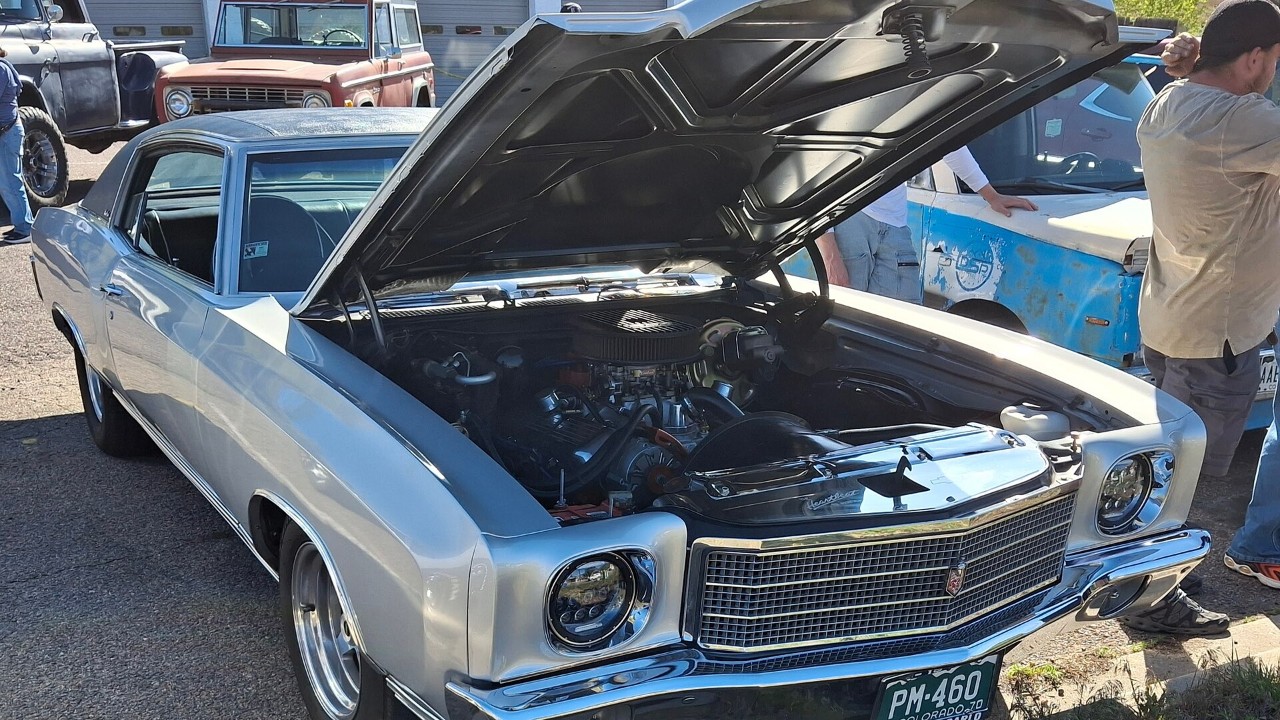 A 1970 Chevrolet Monte Carlo with its hood up