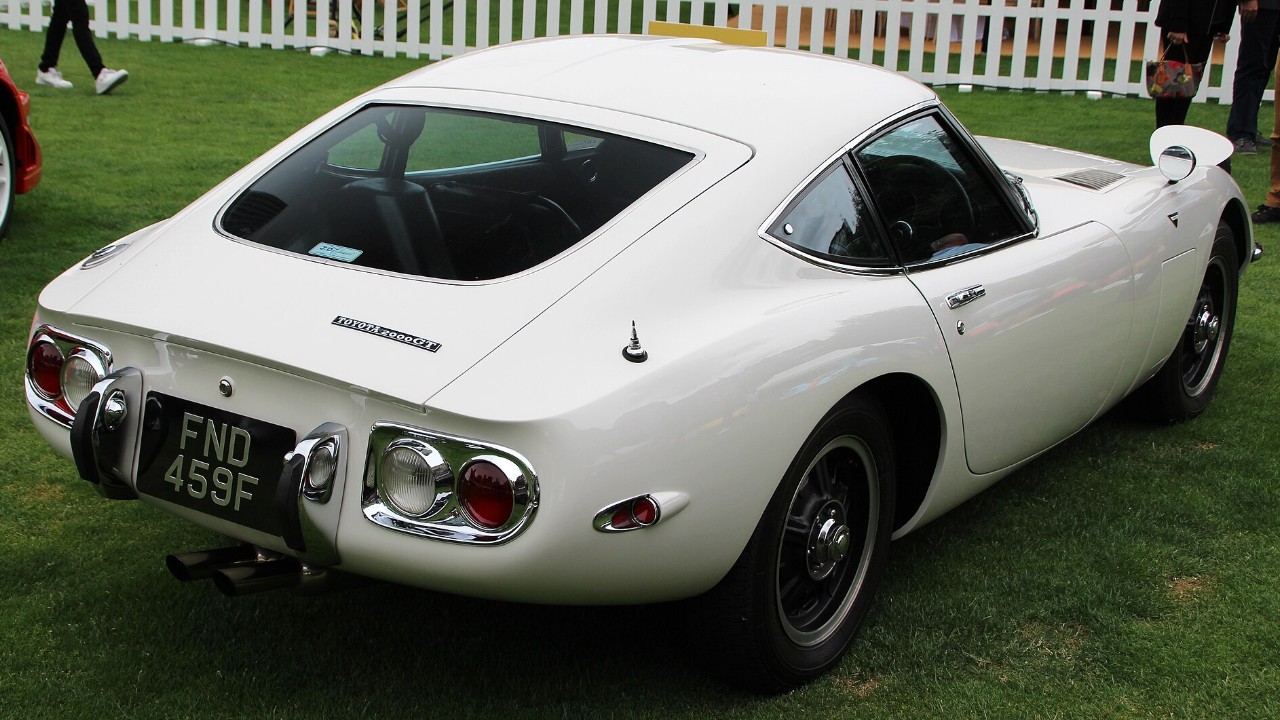 A white 1968 Toyota 2000GT from the rear; Toyota 2000GT production totaled 351 cars