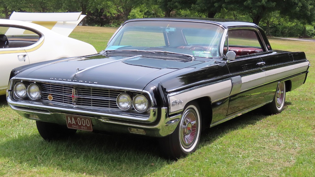 A 1962 Oldsmobile Starfire coupe