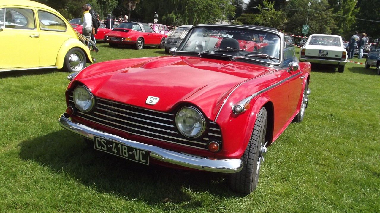 A red Triumph TR5 PI