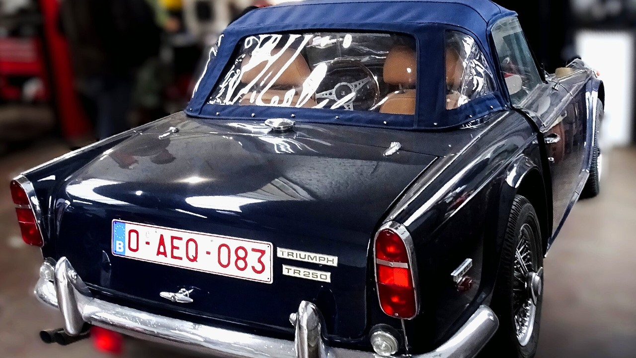 A dark blue Triumph TR250