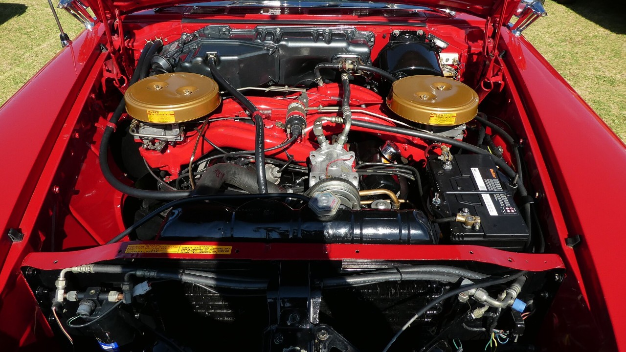 The cross-ram 413 V8 with two four-barrel carburetors in a 1960 Chrysler 300F, the engine of every Chrysler 300F convertible