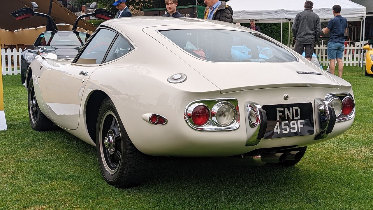 A white Toyota 2000GT coupe, the car Toyota turned into the Toyota 2000GT roadster