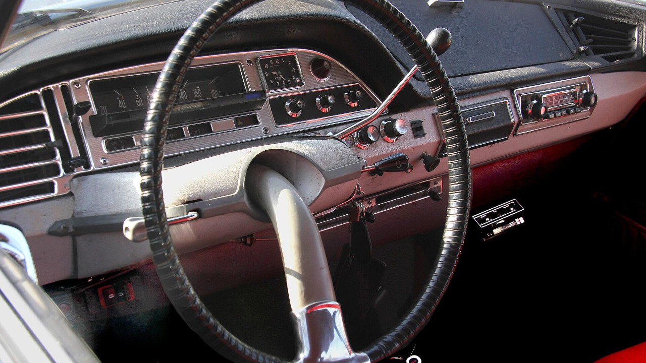The single-spoke wheel and dashboard of a Citroën DS 19, whose DS19 hydraulic system also worked the gear change