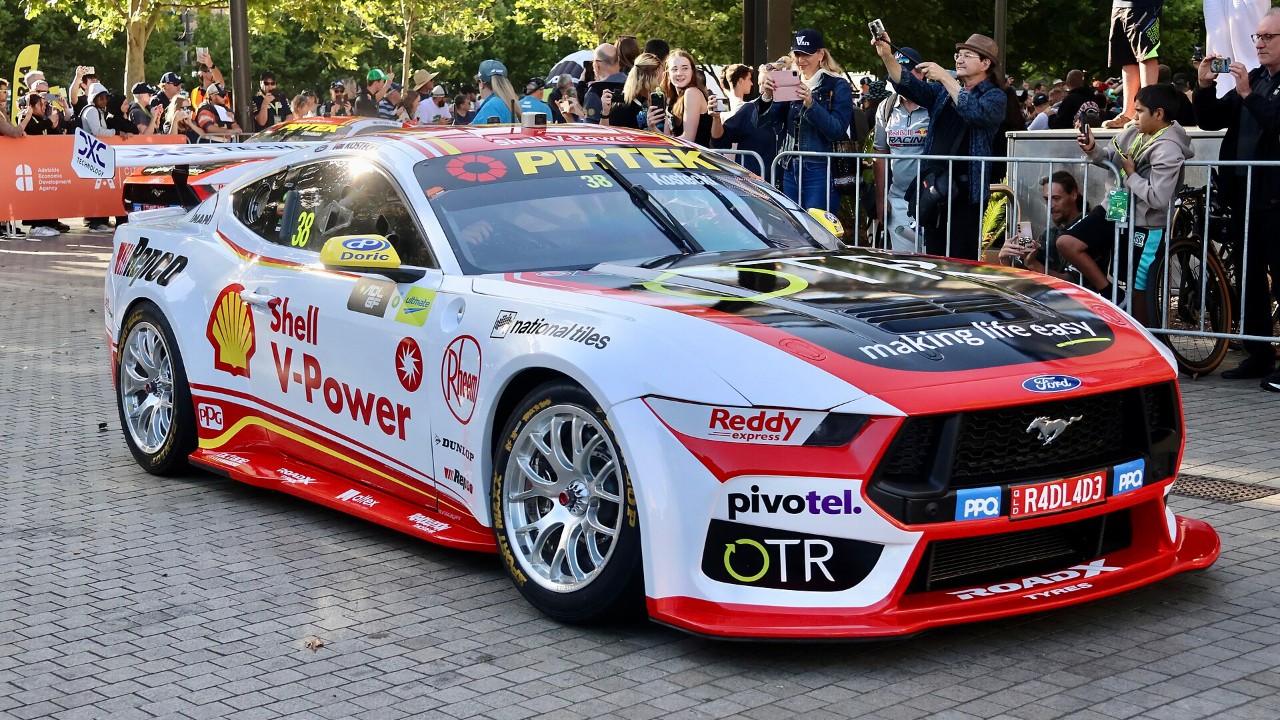 A Ford Mustang won the Bathurst 1000 by 1.184 seconds after the leading Camaro ran dry on the last lap