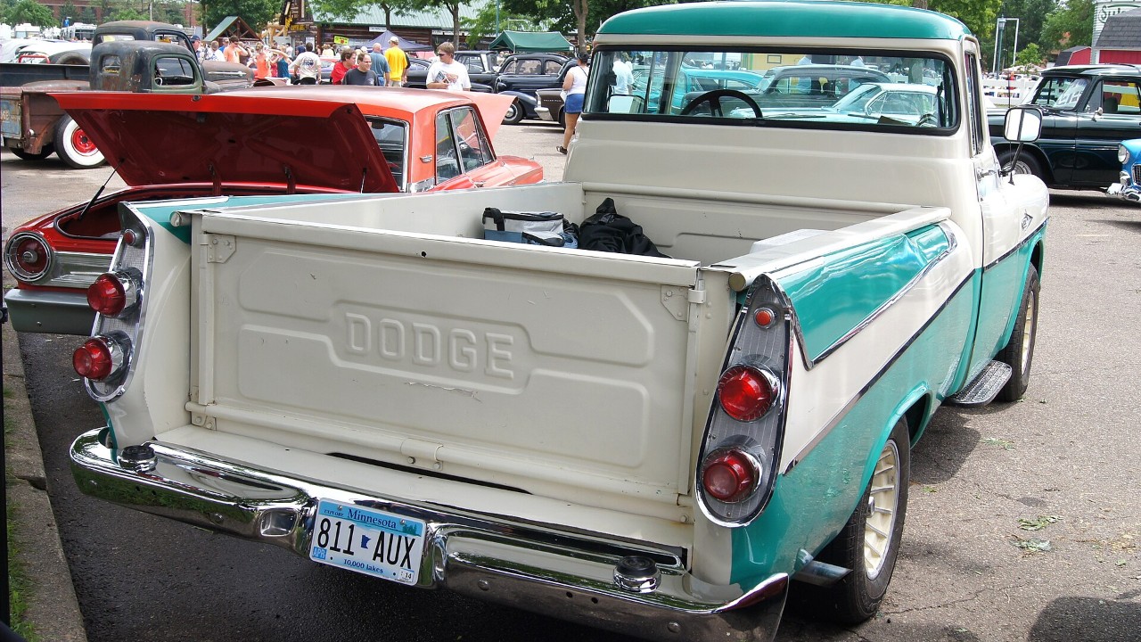 The rear of a Dodge Sweptside, showing the station-wagon fenders