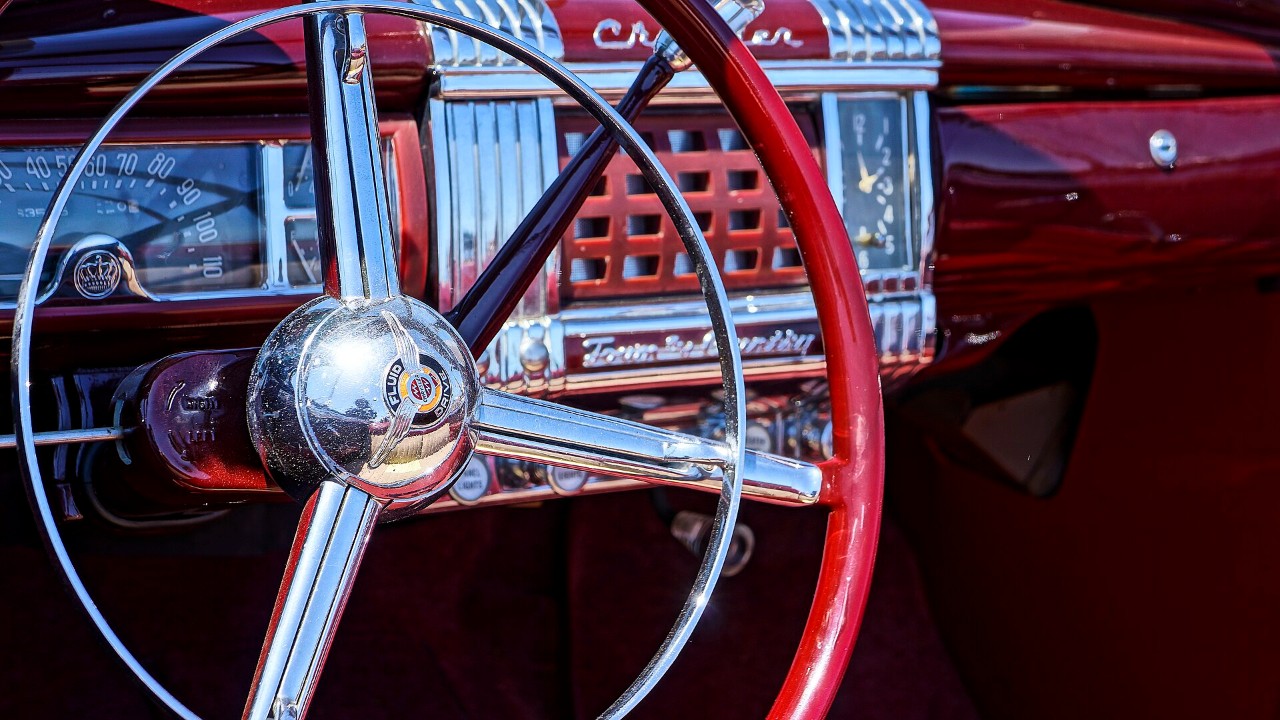 A Fluid Drive badge on a vintage Chrysler Corporation car