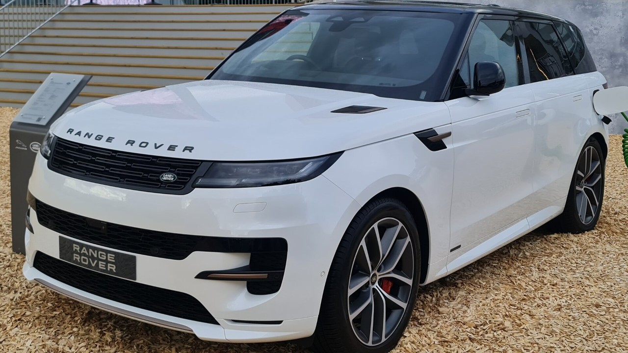 A white current-generation Range Rover Sport, the model in the Range Rover subframe recall