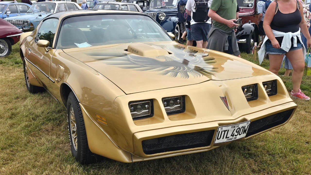 A gold 1979 Pontiac Firebird Trans Am