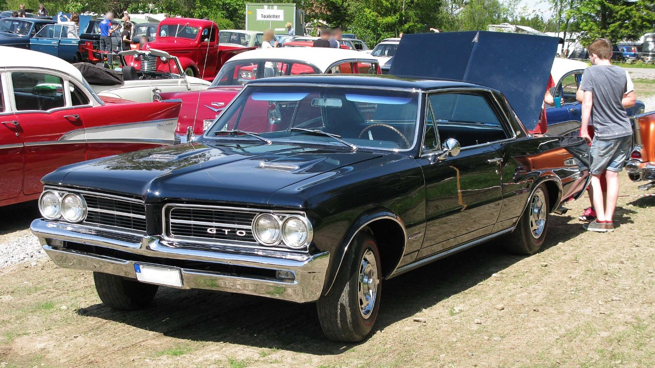 A 1964 Pontiac GTO Tri-Power convertible