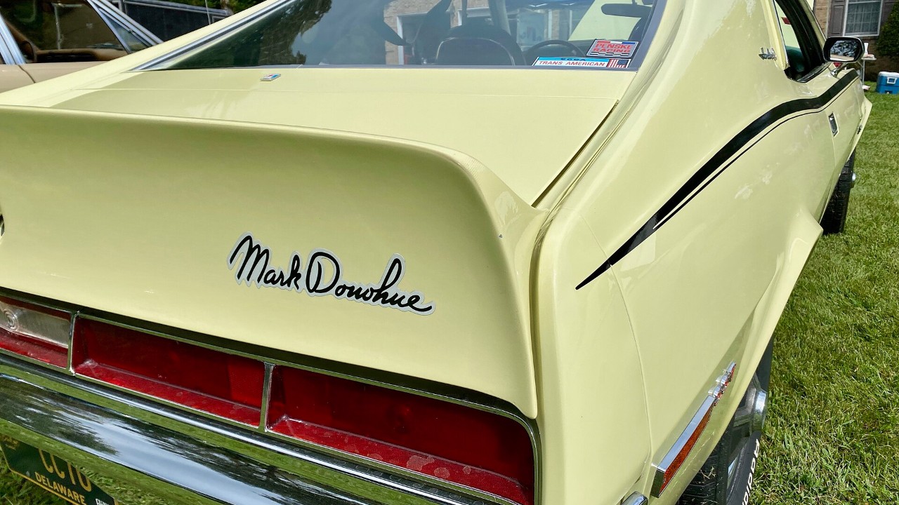 The rear spoiler and Mark Donohue signature on a 1970 AMC Javelin Mark Donohue edition