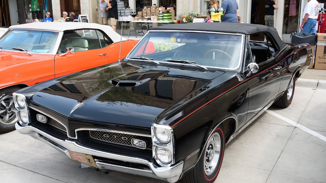 A 1967 Pontiac GTO Royal Bobcat convertible from Royal Pontiac (1967 car shown; the item covers 1968)