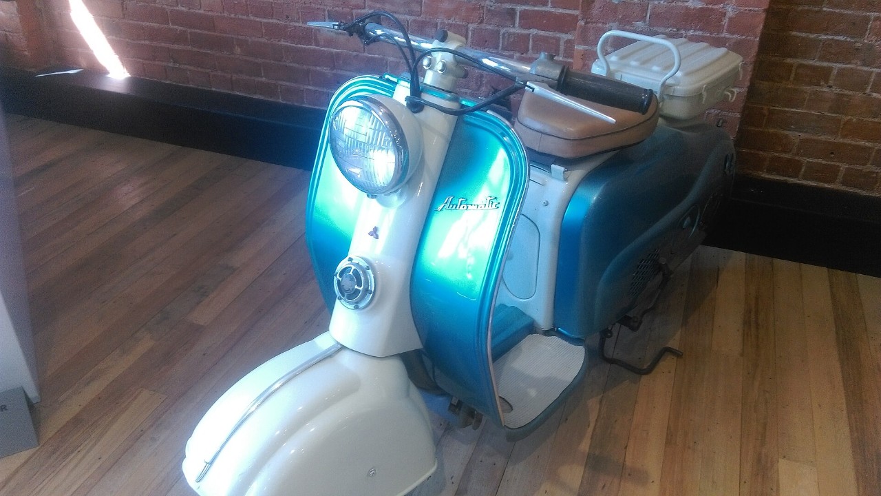 A Mitsubishi Silver Pigeon scooter