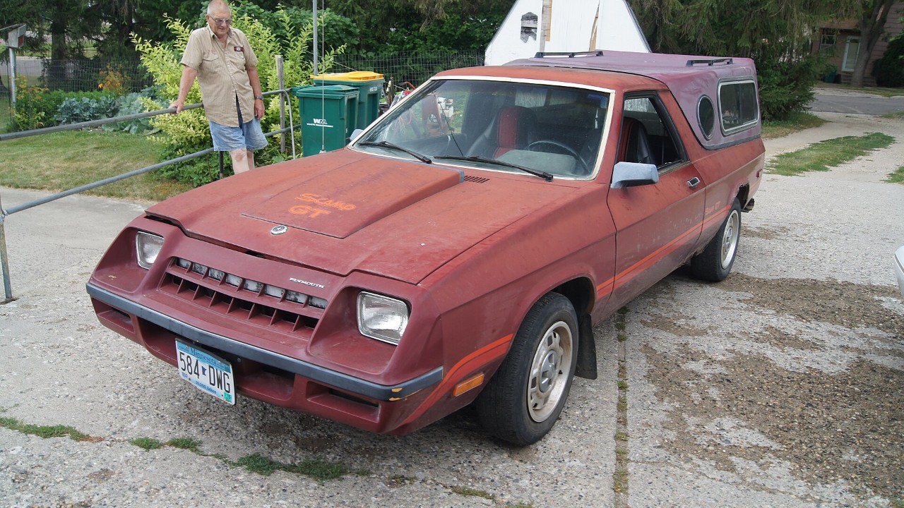 A red 1983 Plymouth Scamp