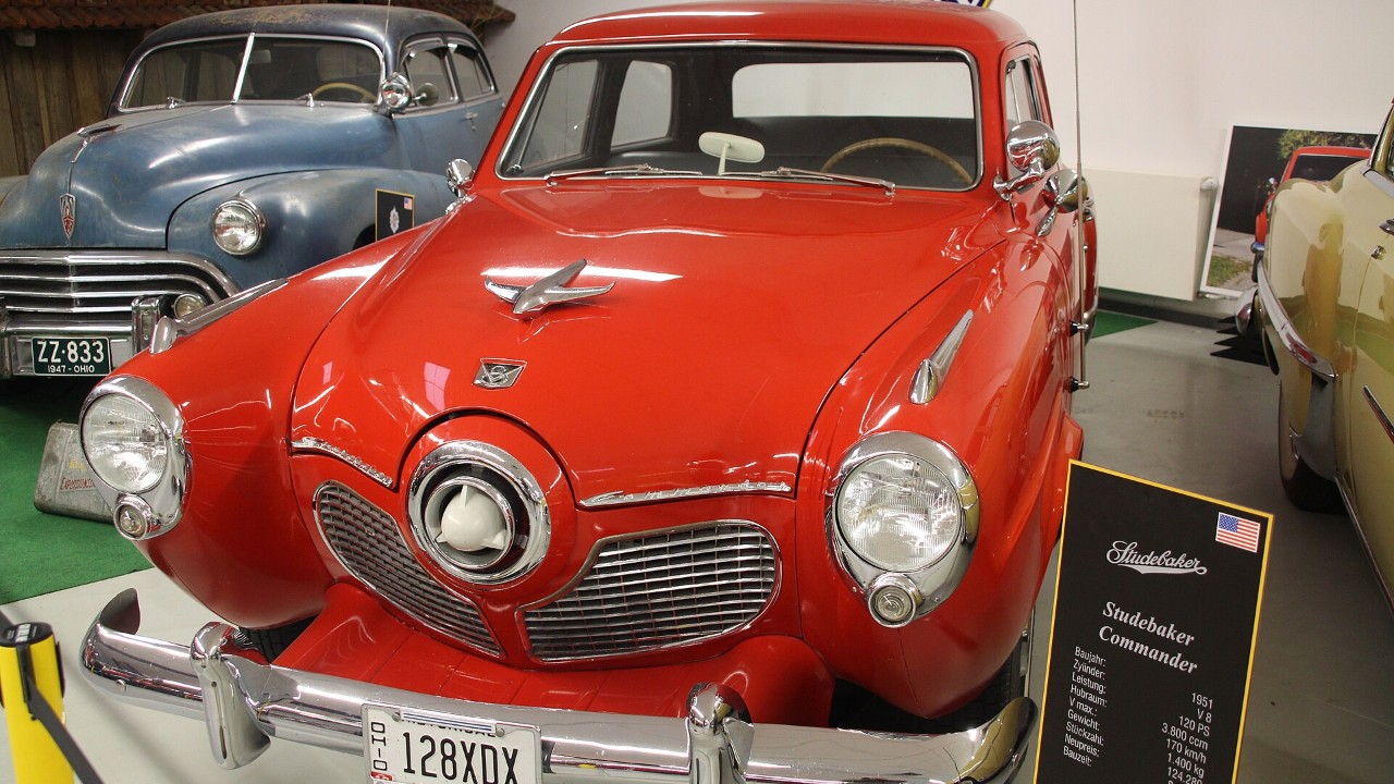 A red 1951 Studebaker Commander V8
