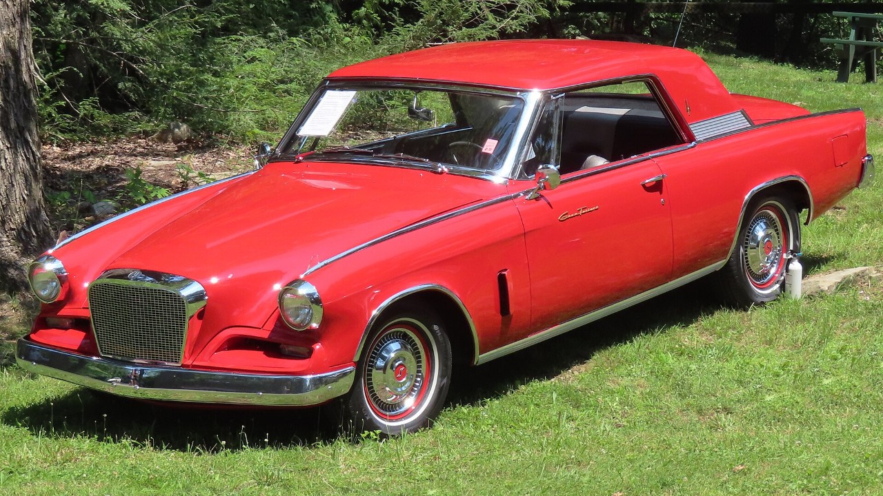 A red 1962 Studebaker Gran Turismo Hawk
