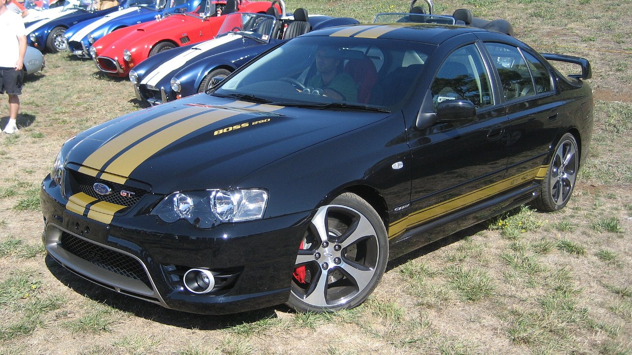 An FPV BF GT 40th Anniversary sedan in black with gold stripes