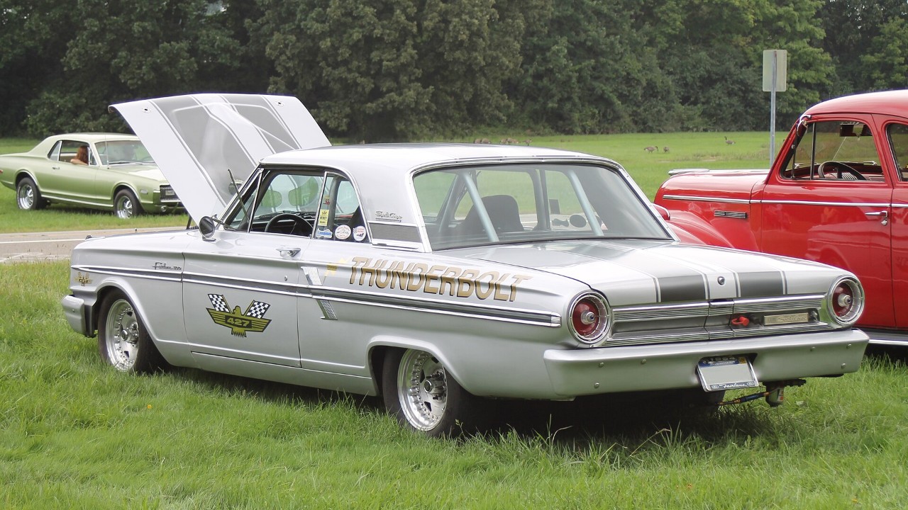 A white 1964 Ford Fairlane Thunderbolt
