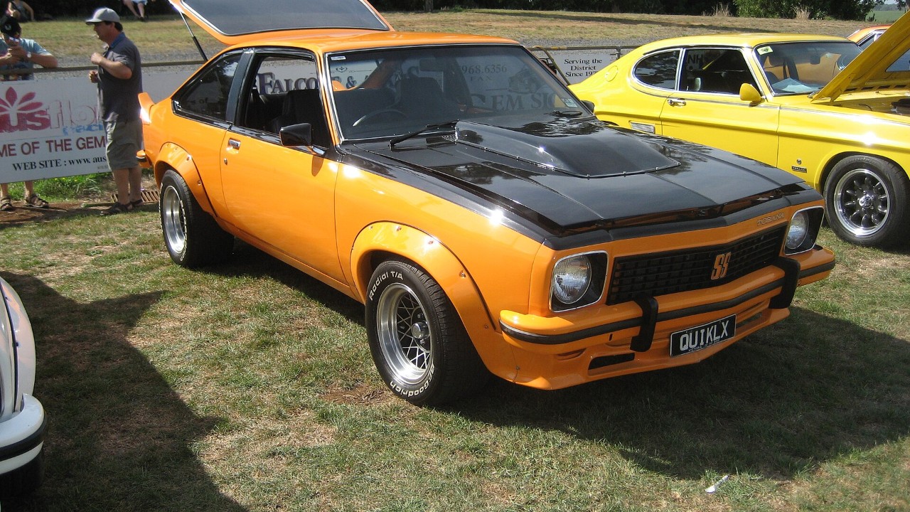 An orange 1977 Holden LX Torana SS A9X hatchback