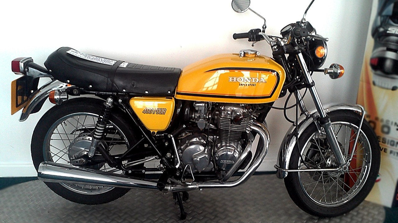 A yellow Honda CB400 Four