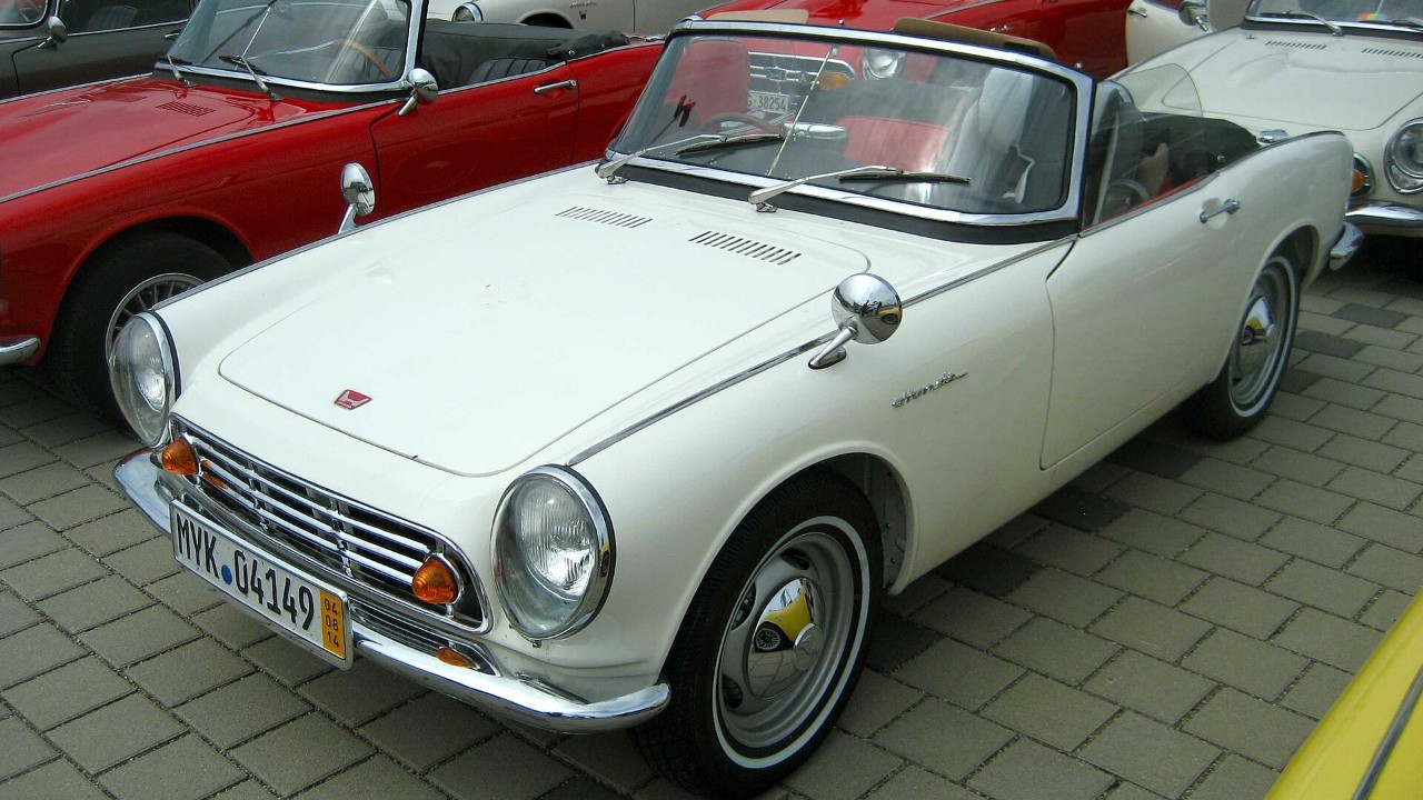 A white Honda S500 roadster