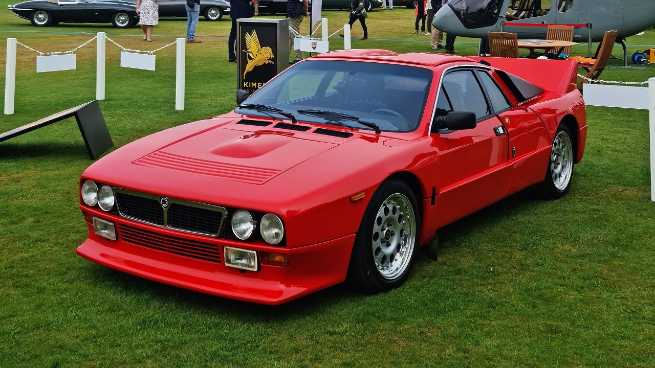 A red Lancia Rally 037 Stradale road car