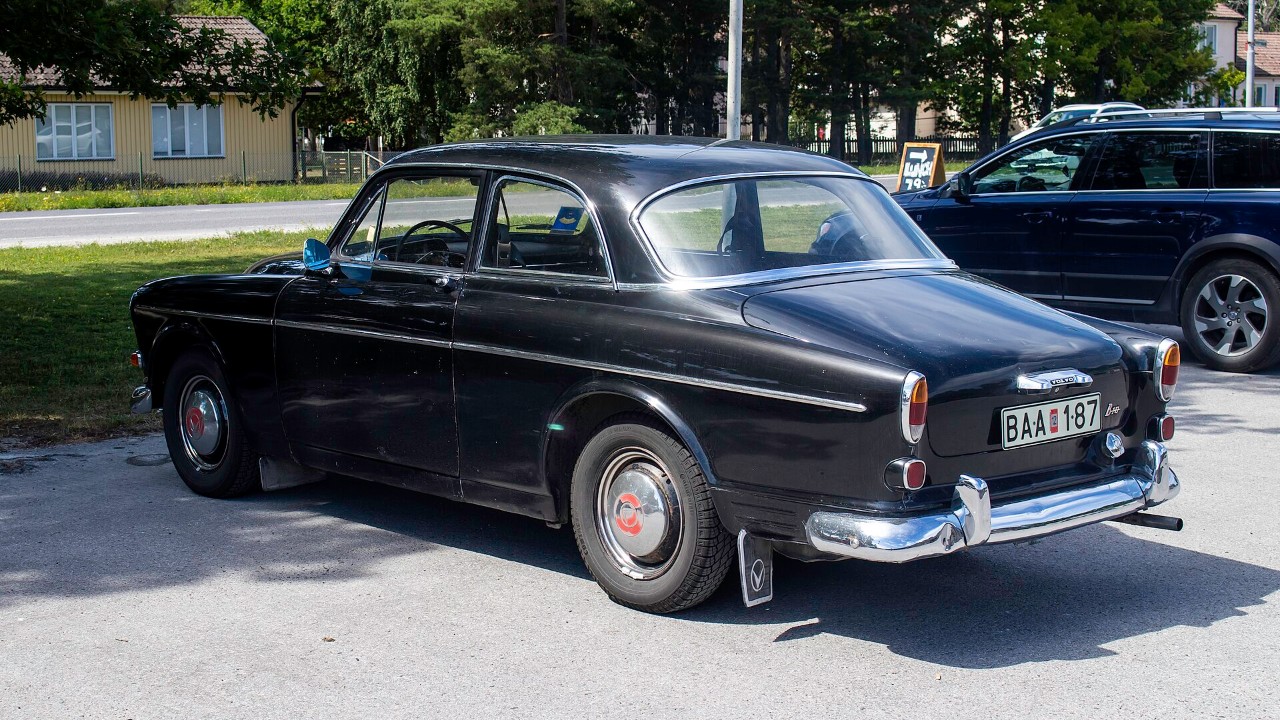 A dark Volvo Amazon four-door, the car Volvo's Canadian was based on