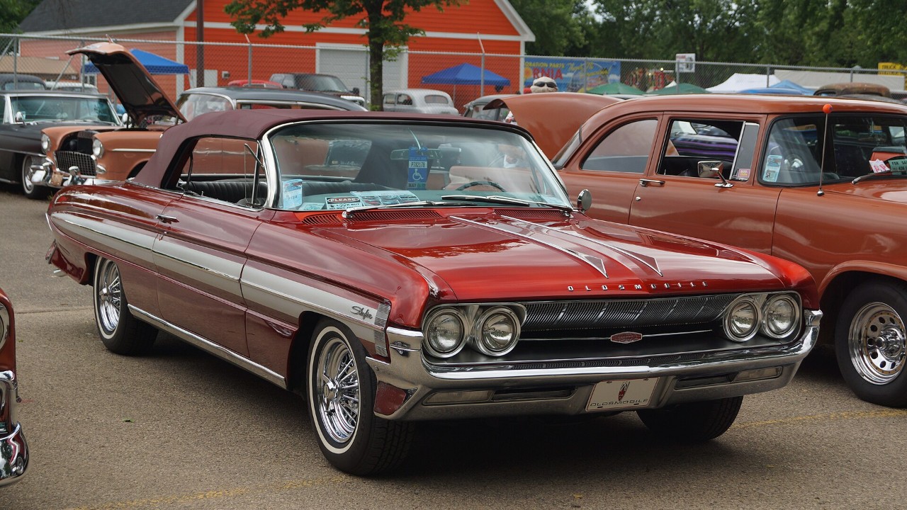 A 1961 Oldsmobile Starfire convertible